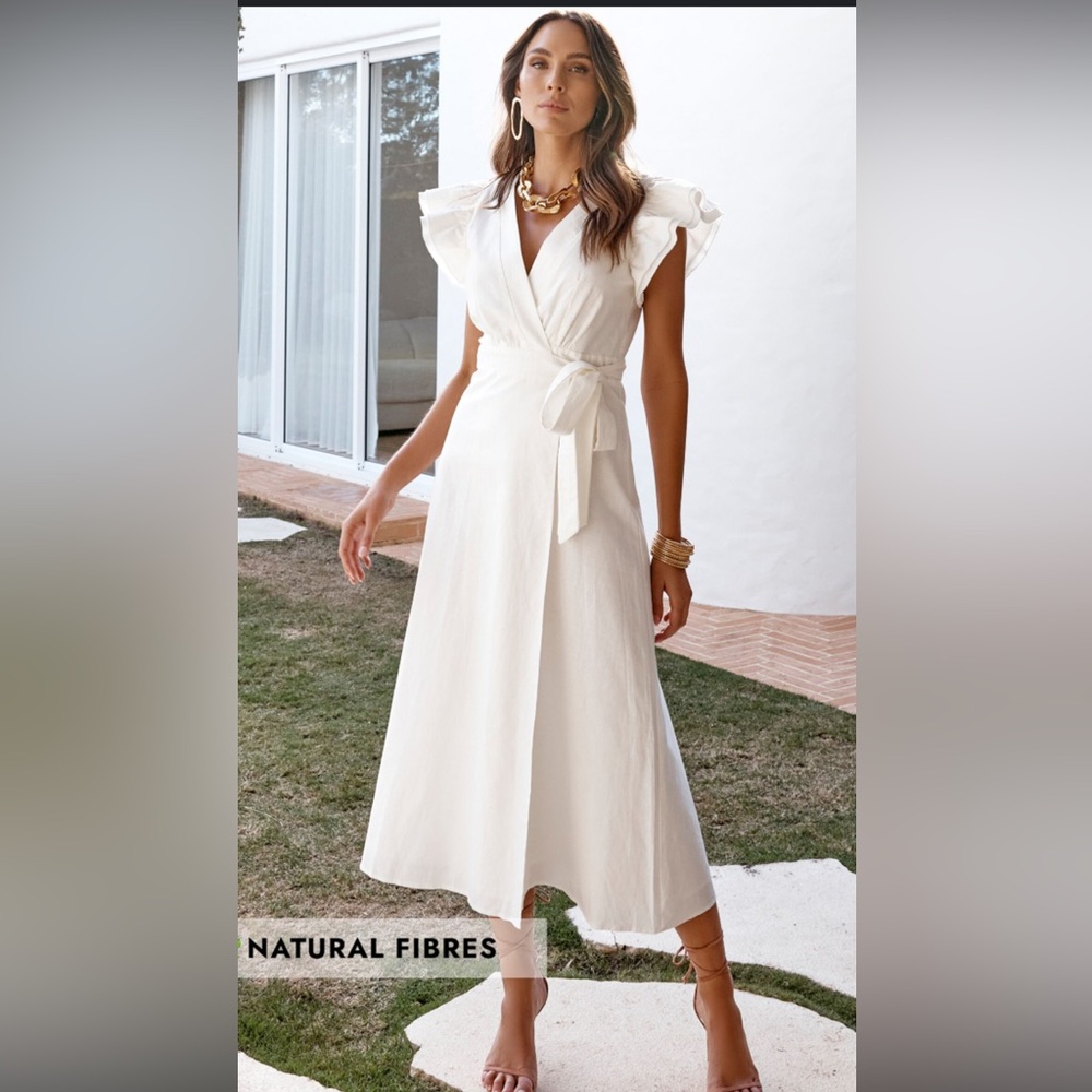 Amalie the label size US 14 new with tags 
White linen wrap dress